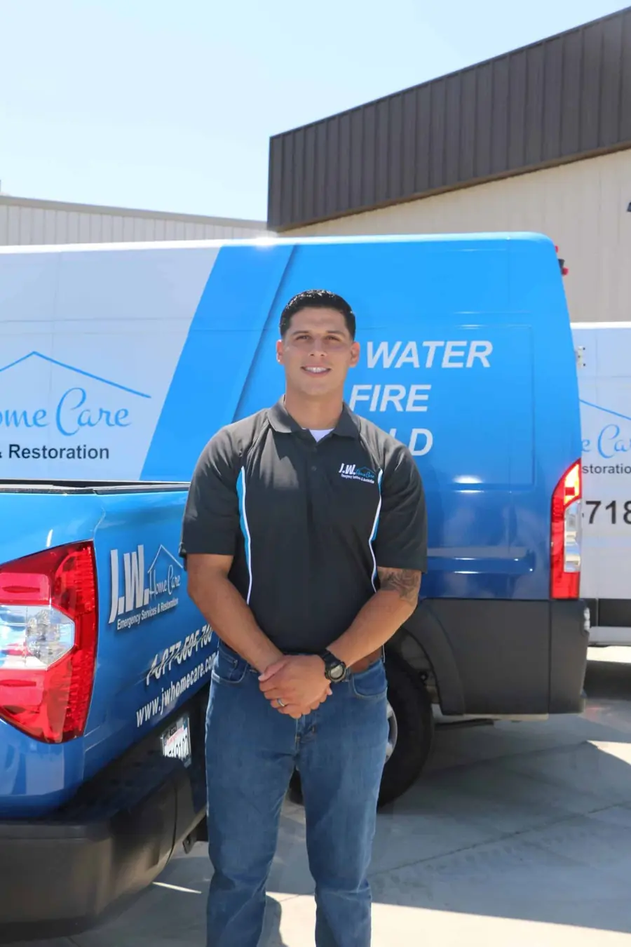 JW Home Care technician working out of a restoration van on a job site